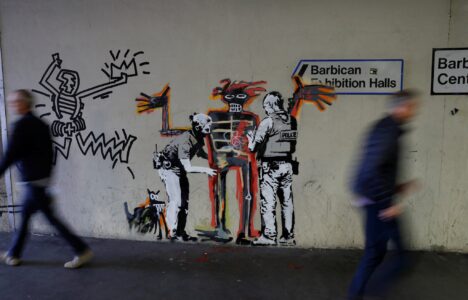 A mural painted by the artist Banksy, near the Barbican Center in London.